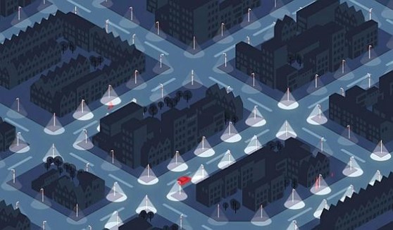 Urban street at dusk with modern LED streetlights equipped with motion sensors and wireless controllers that automatically adjust brightness based on pedestrian and vehicle movement, demonstrating energy-efficient adaptive illumination.