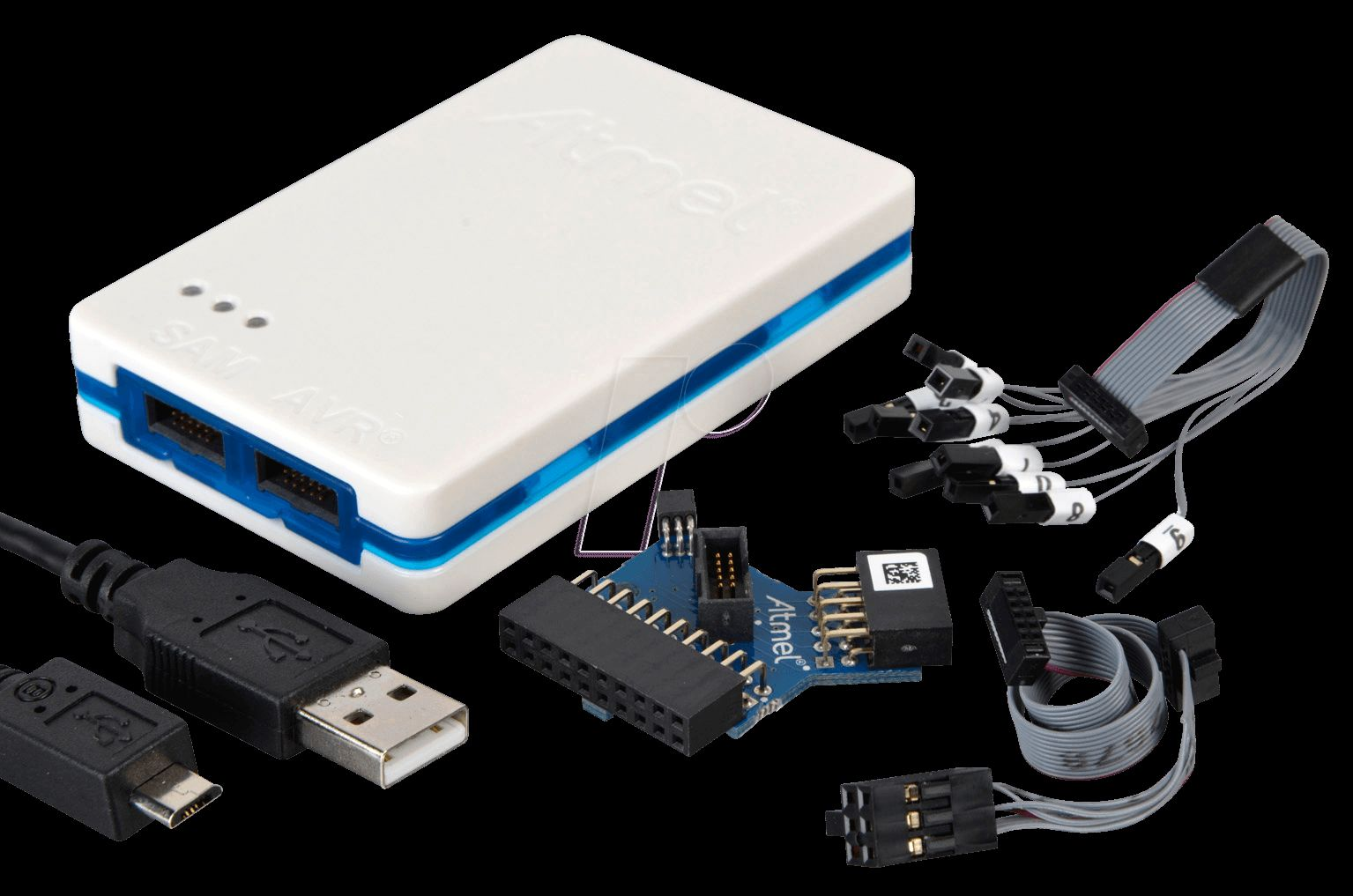 Professional hardware debugging kit showing a white rectangular device (logic analyzer or debugger) with USB ports and blue LED indicators, alongside multiple cable adapters including JTAG ribbon cable connector, SWD probe clips, and various debugging probes for connecting to IoT device test points and extracting firmware or debugging hardware.